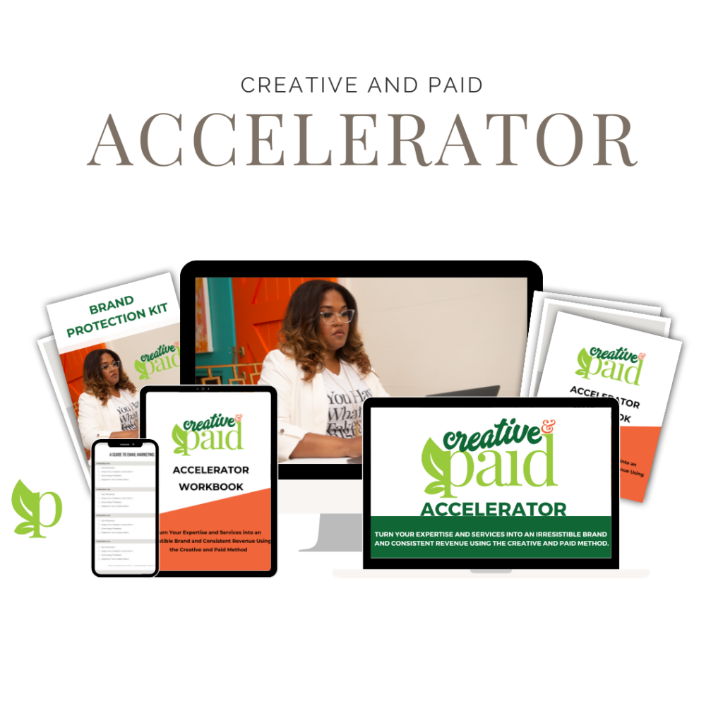 creative and paid accelerator mockup with computers and workbook